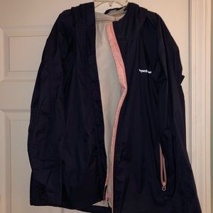 Navy and pink accent rain jacket